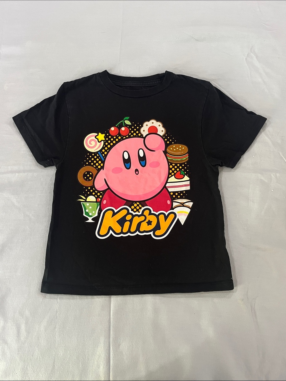 Nintendo Black Kirby Graphic Tee with Pink Character and Yellow Logo